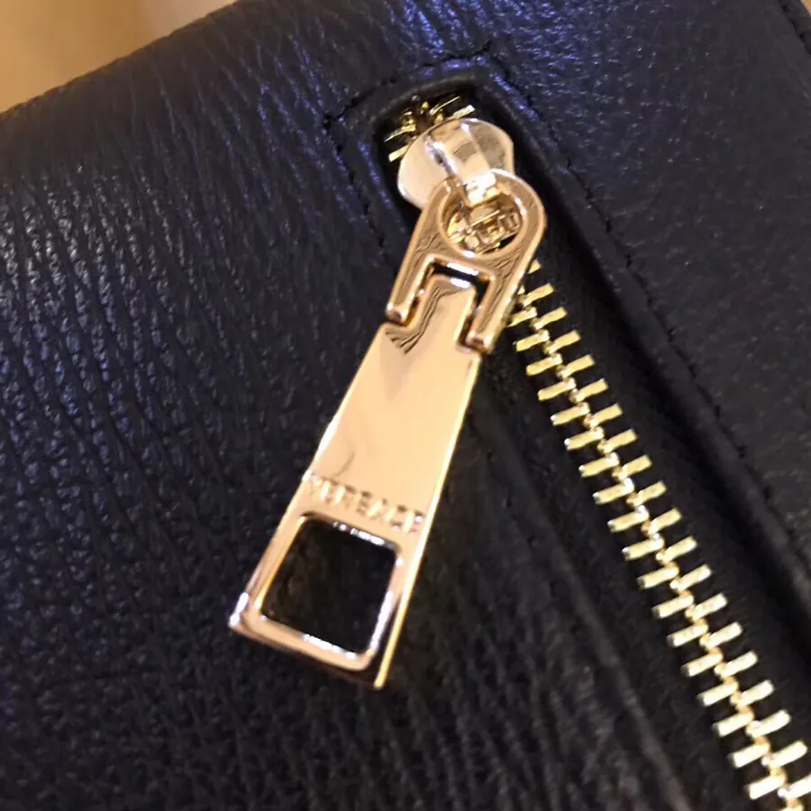 New Handbag with Embroidered V Brand, Soft Leather, Elegant and Stylish