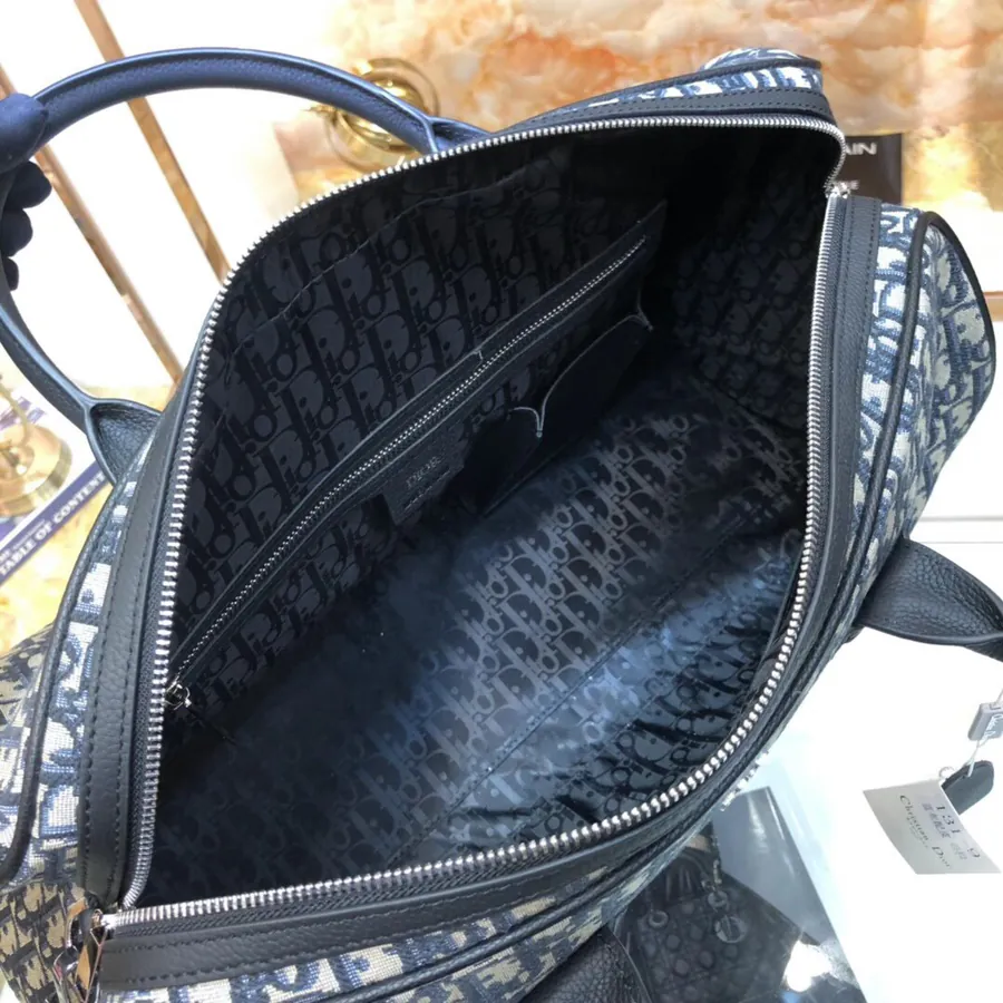 Dior Travel Bag Latest Design, Black Grained Calfskin, Oblique Pattern, Sleek and Stylish
