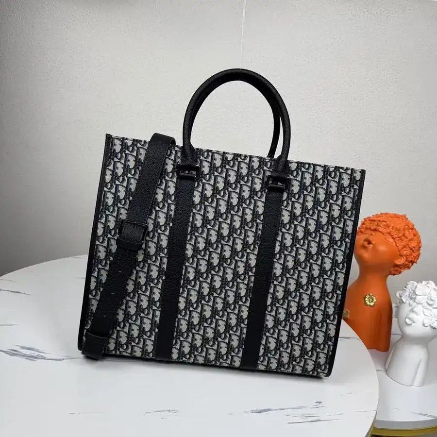 East West Handbag Classic Elegance with Oblique Print and Grained Calfskin