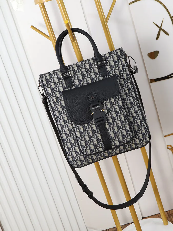 560 Saddle Bag Winter 2024 Collection, Oblique Print & Grained Calfskin