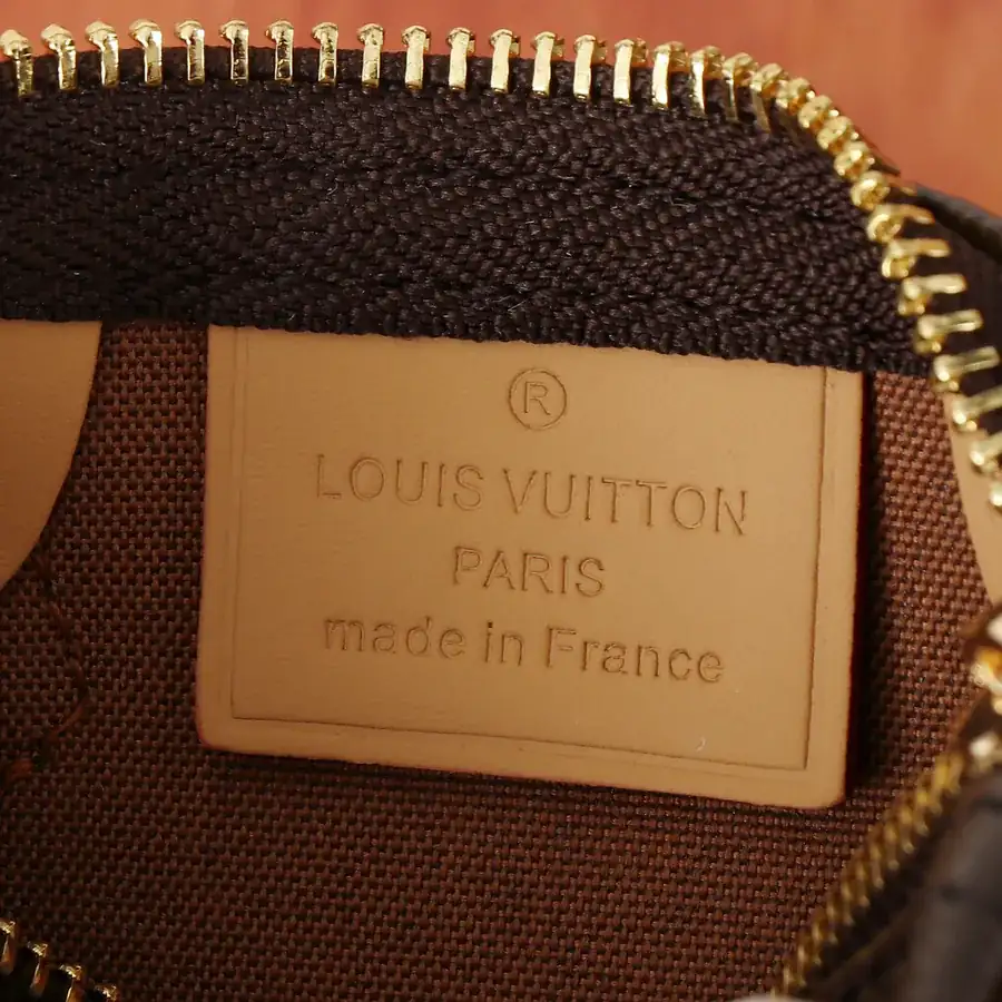 Chanel Nano Speedy Handbag in Classic Monogram Canvas