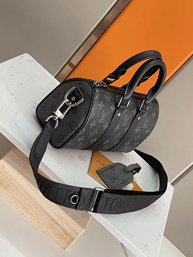 Louis Vuitton Keepall 25 Handbag Monogram Eclipse Reverse Canvas with Leather Trim