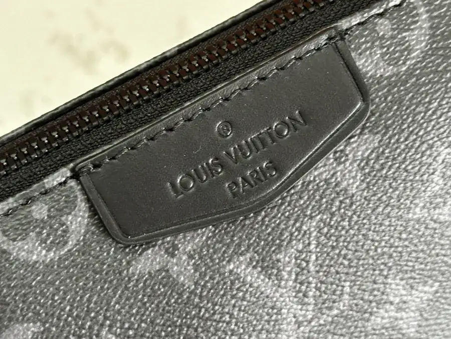 Pochette Accessoire XL Handbag with Monogram Eclipse Canvas and Leather Trim