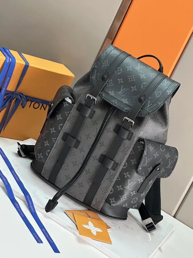 Christopher Small Backpack with Leather Trim and Monogram Eclipse Reverse Canvas