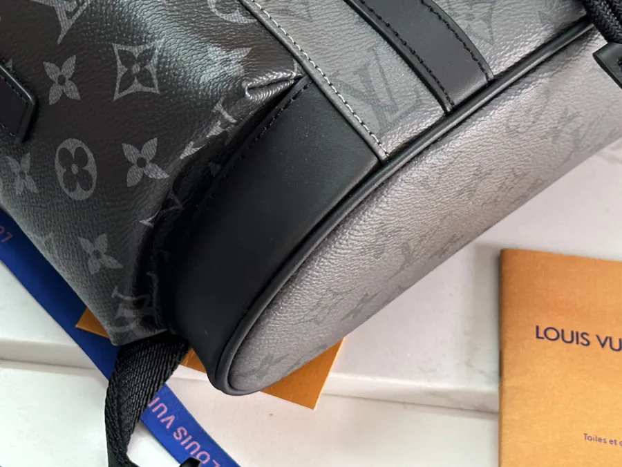 Christopher Small Backpack with Leather Trim and Monogram Eclipse Reverse Canvas