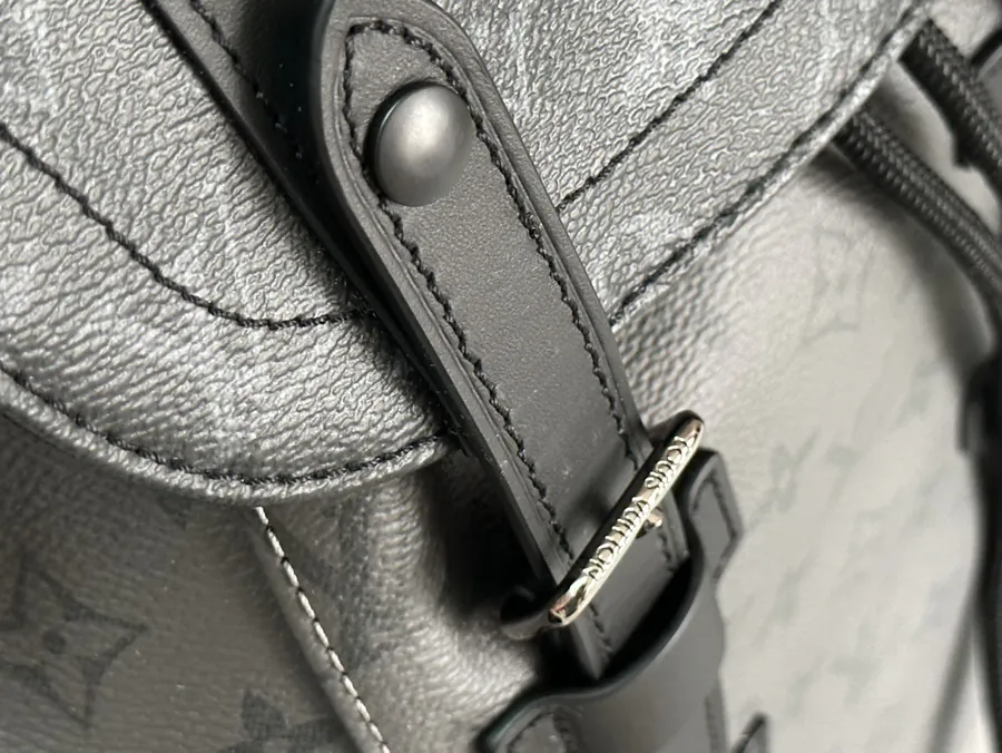 Christopher Small Backpack with Leather Trim and Monogram Eclipse Reverse Canvas