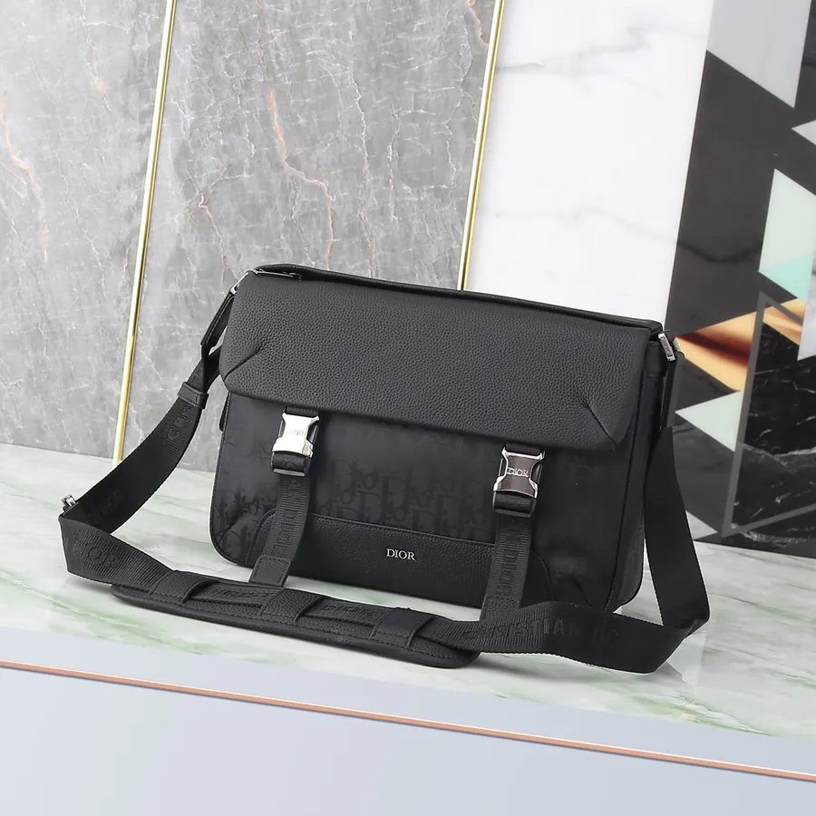 Explorer Handbag with Classic Messenger Style, Grained Calfskin and Oblique Print