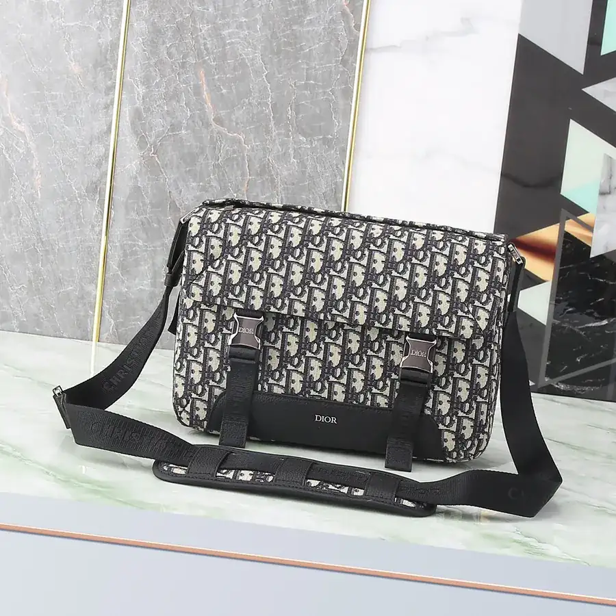 Explorer Handbag with Classic Messenger Style, Grained Calfskin and Oblique Print