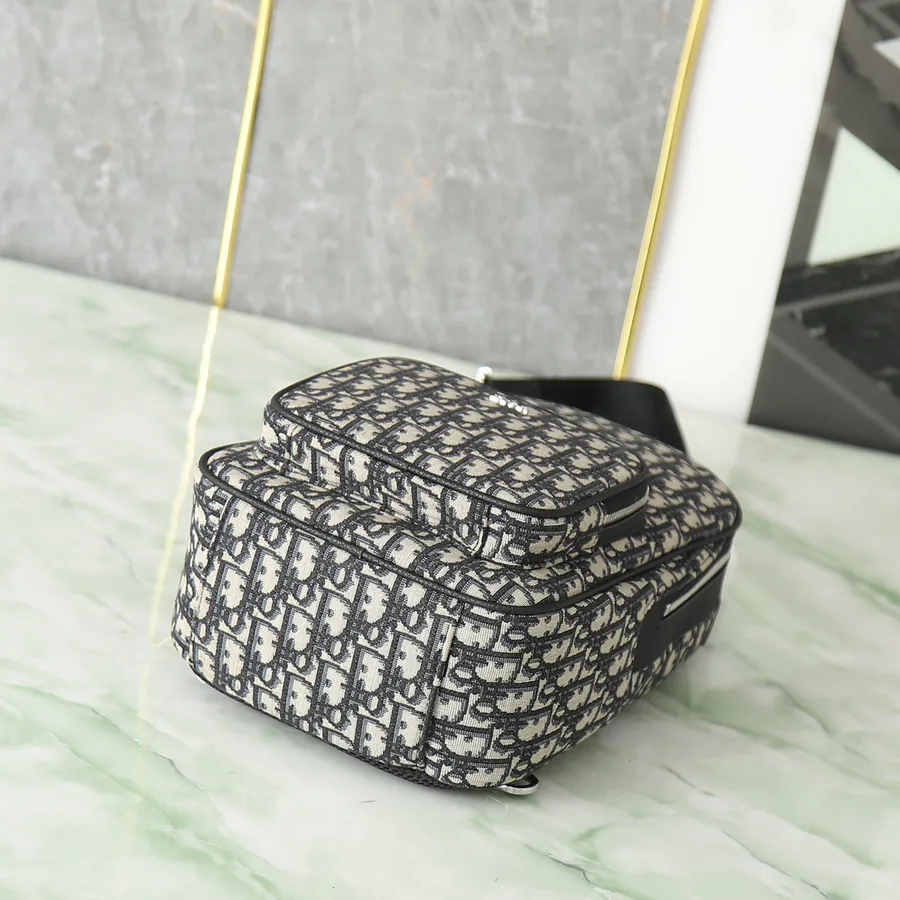 Rider Inspired Oblique Print Crossbody Backpack
