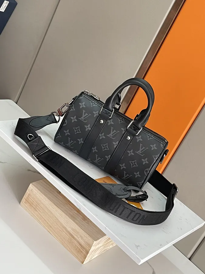 Louis Vuitton Keepall 25 Handbag with Monogram Eclipse Reverse Canvas