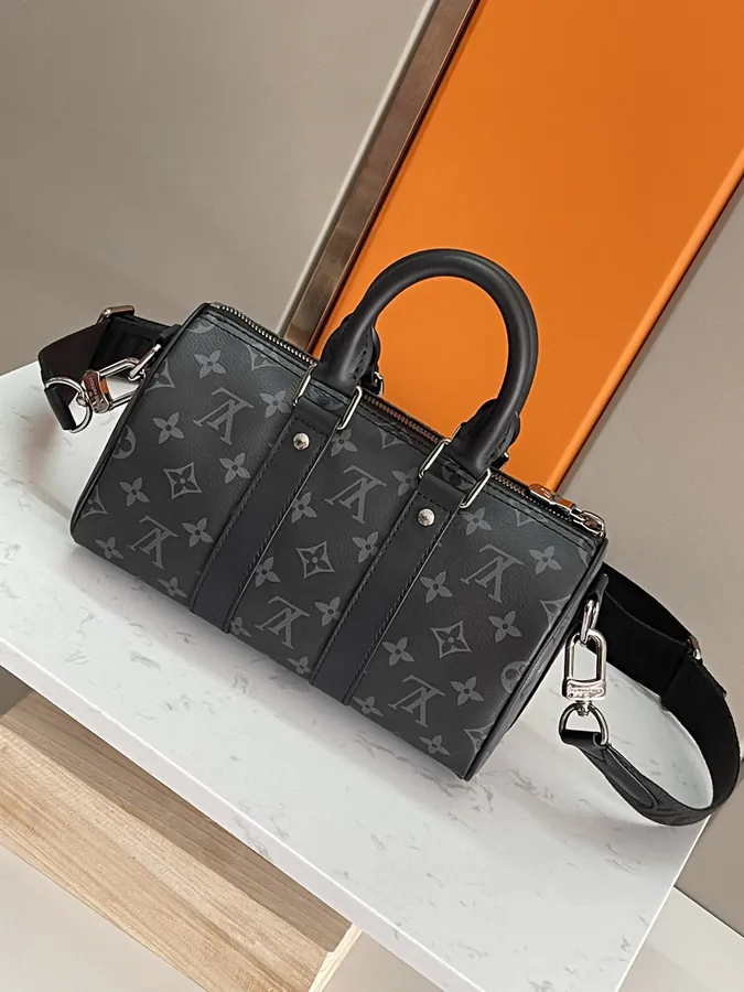 Louis Vuitton Keepall 25 Handbag with Monogram Eclipse Reverse Canvas