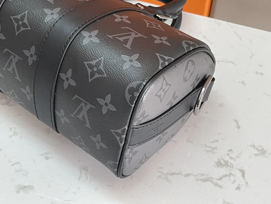 Louis Vuitton Keepall 25 Handbag with Monogram Eclipse Reverse Canvas