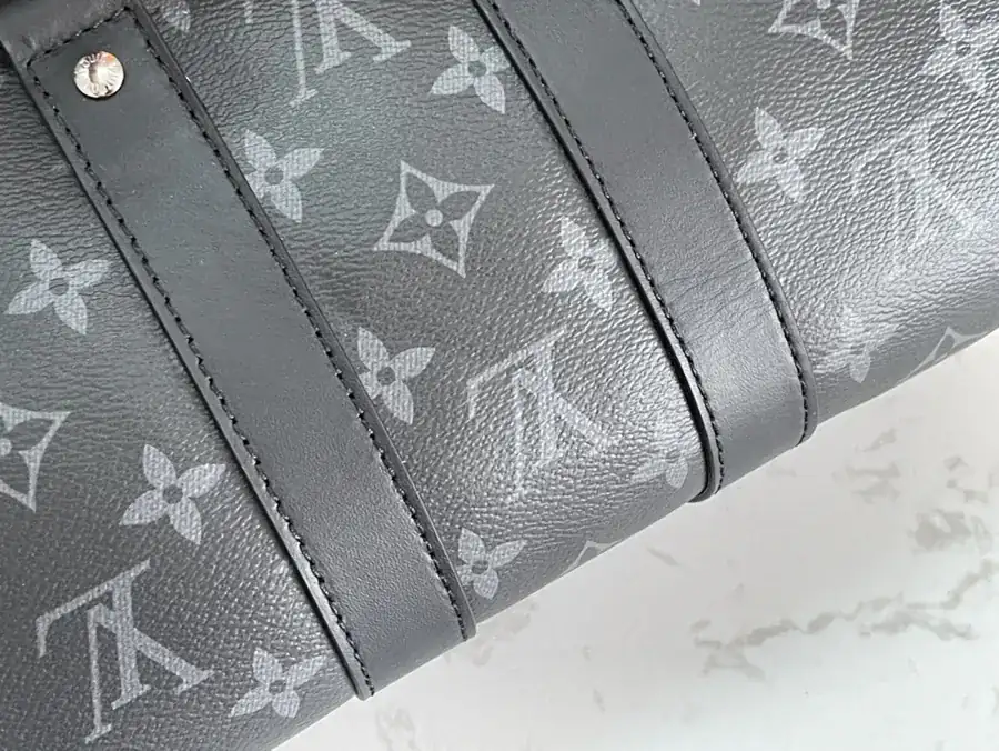 Louis Vuitton Keepall 25 Handbag with Monogram Eclipse Reverse Canvas