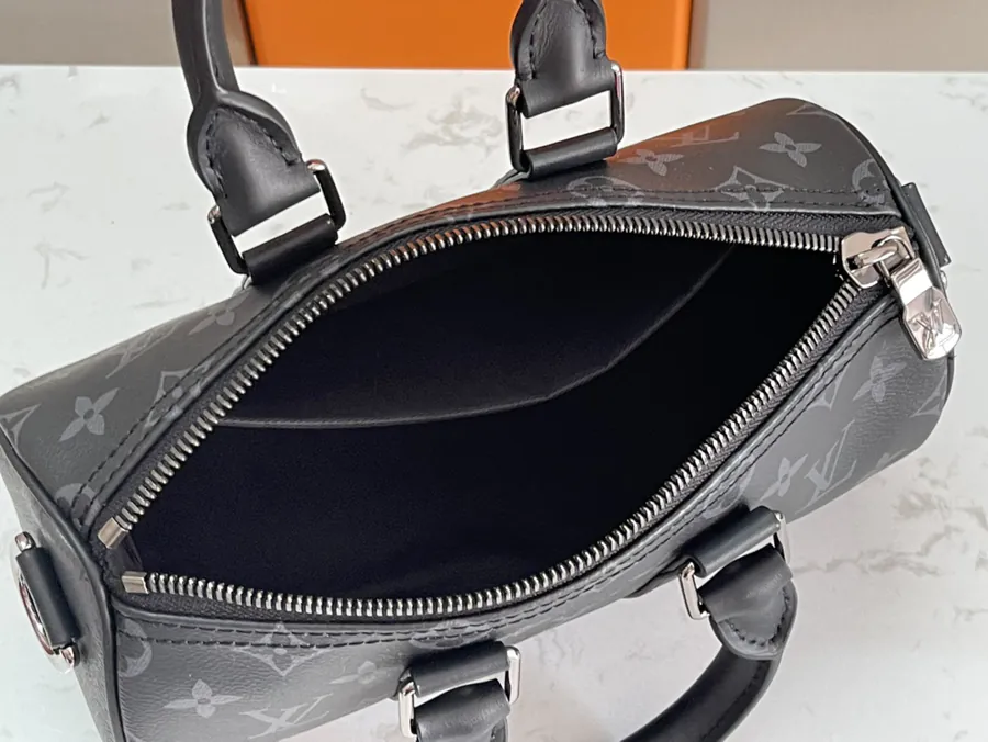 Louis Vuitton Keepall 25 Handbag with Monogram Eclipse Reverse Canvas