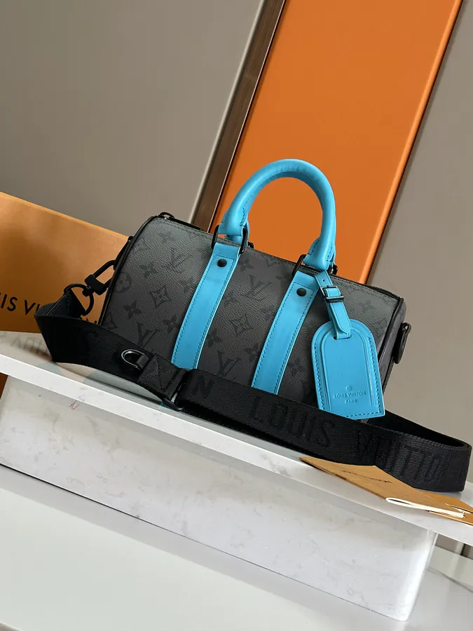 Keepall Bandoulière 25 Handbag with Monogram Eclipse Reverse Canvas and Leather Trim