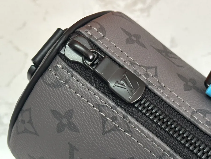 Keepall Bandoulière 25 Handbag with Monogram Eclipse Reverse Canvas and Leather Trim