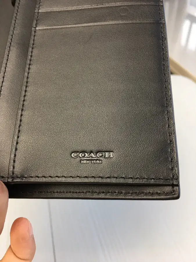 Coach Men's Folded Wallet with Embossed Design