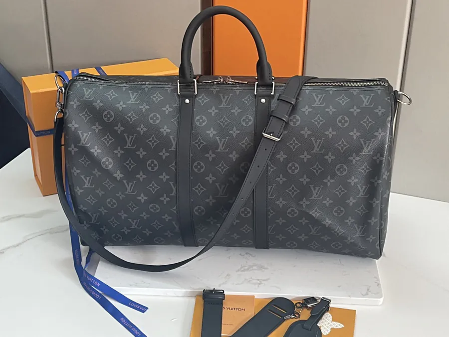 Keepall 55 Travel Bag Monogram Eclipse Canvas with Grained Calfskin Trim