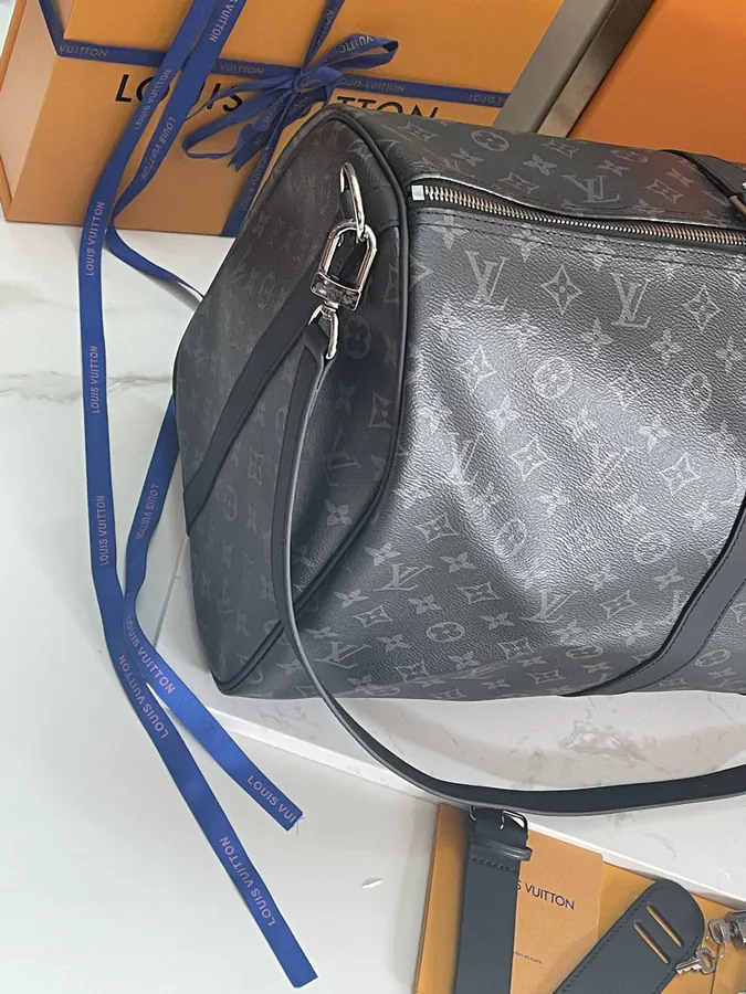 Keepall 55 Travel Bag Monogram Eclipse Canvas with Grained Calfskin Trim