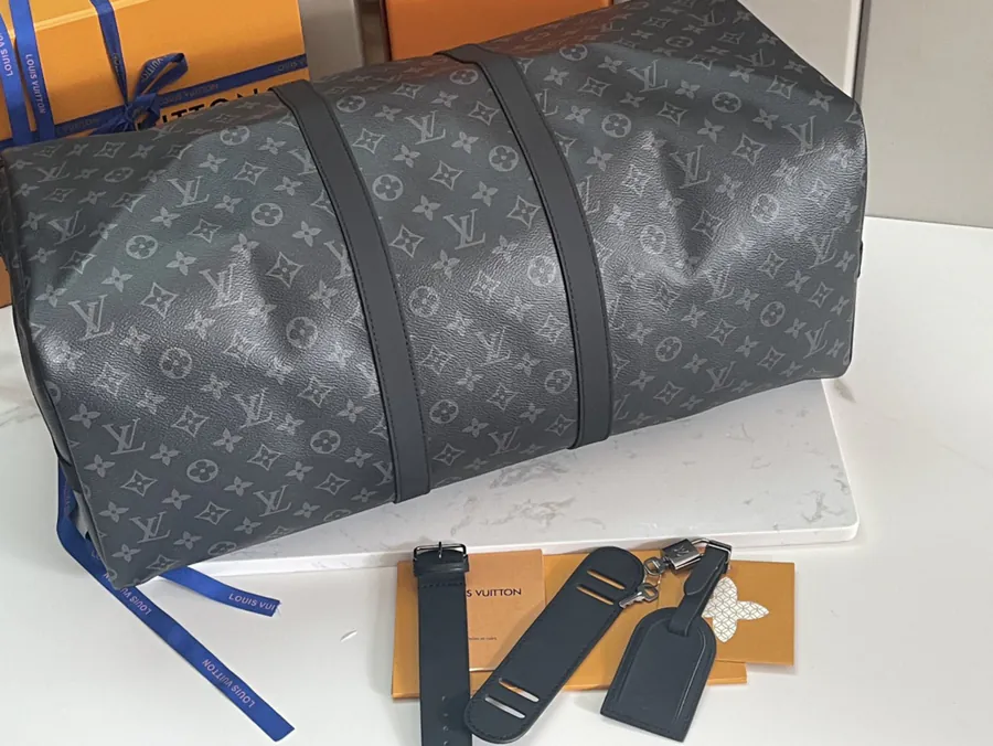 Keepall 55 Travel Bag Monogram Eclipse Canvas with Grained Calfskin Trim
