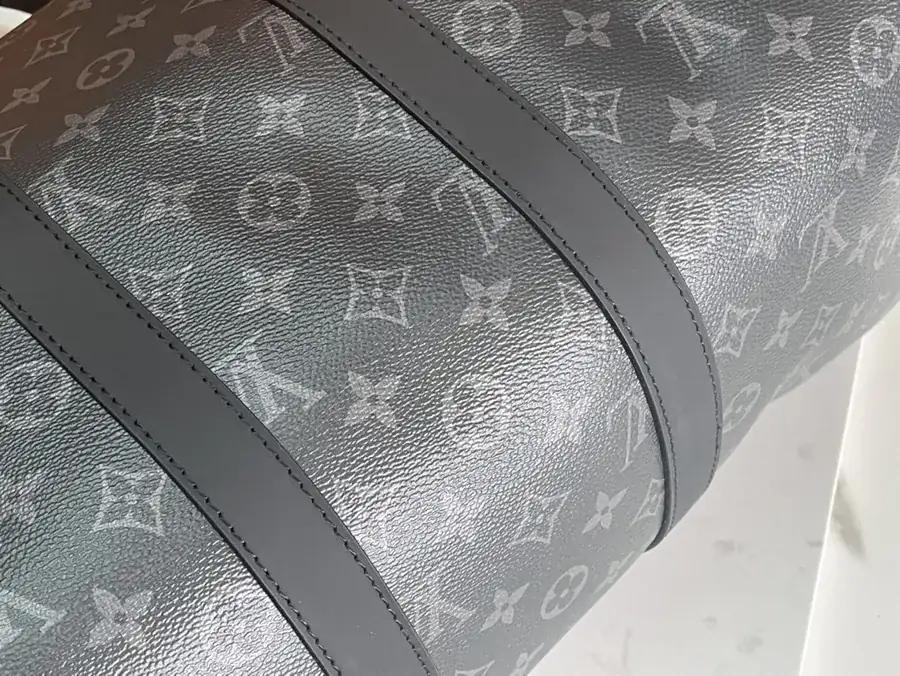 Keepall 55 Travel Bag Monogram Eclipse Canvas with Grained Calfskin Trim