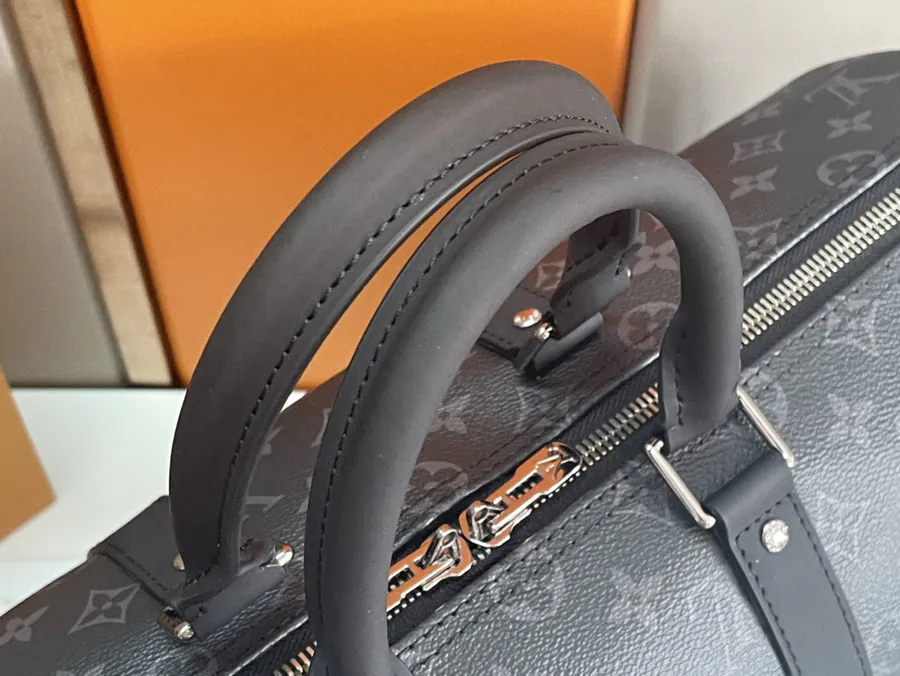 Keepall 55 Travel Bag Monogram Eclipse Canvas with Grained Calfskin Trim