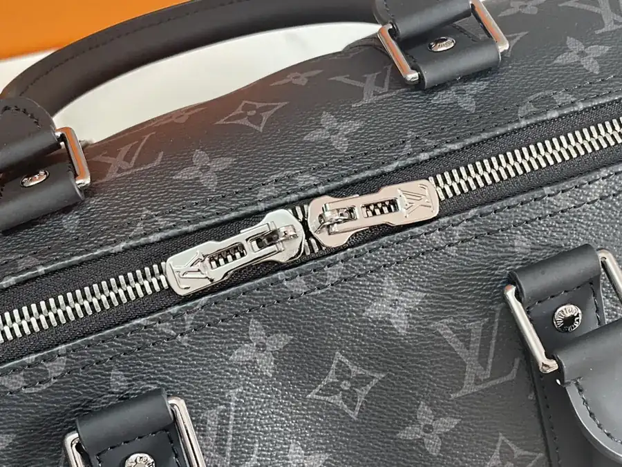 Keepall 55 Travel Bag Monogram Eclipse Canvas with Grained Calfskin Trim