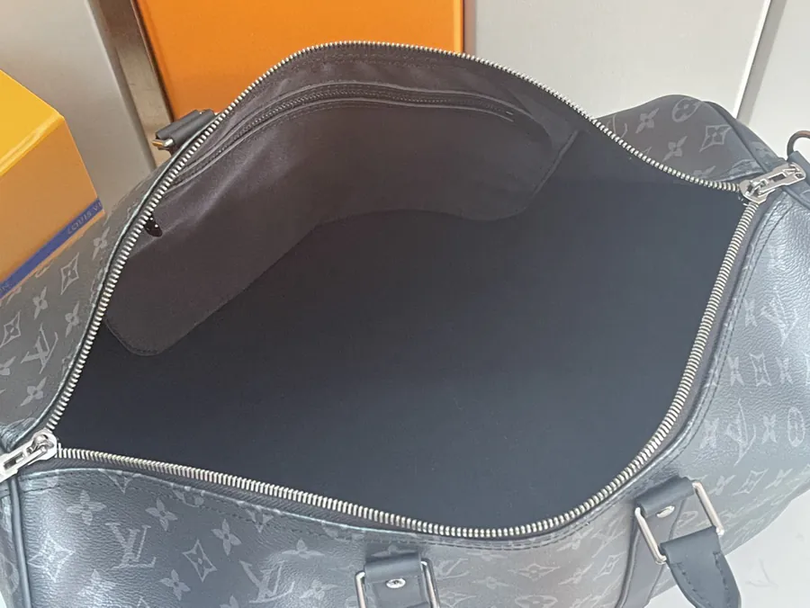 Keepall 55 Travel Bag Monogram Eclipse Canvas with Grained Calfskin Trim