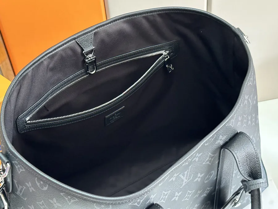 Weekend Tote Handbag in Monogram Canvas and Taïga Leather