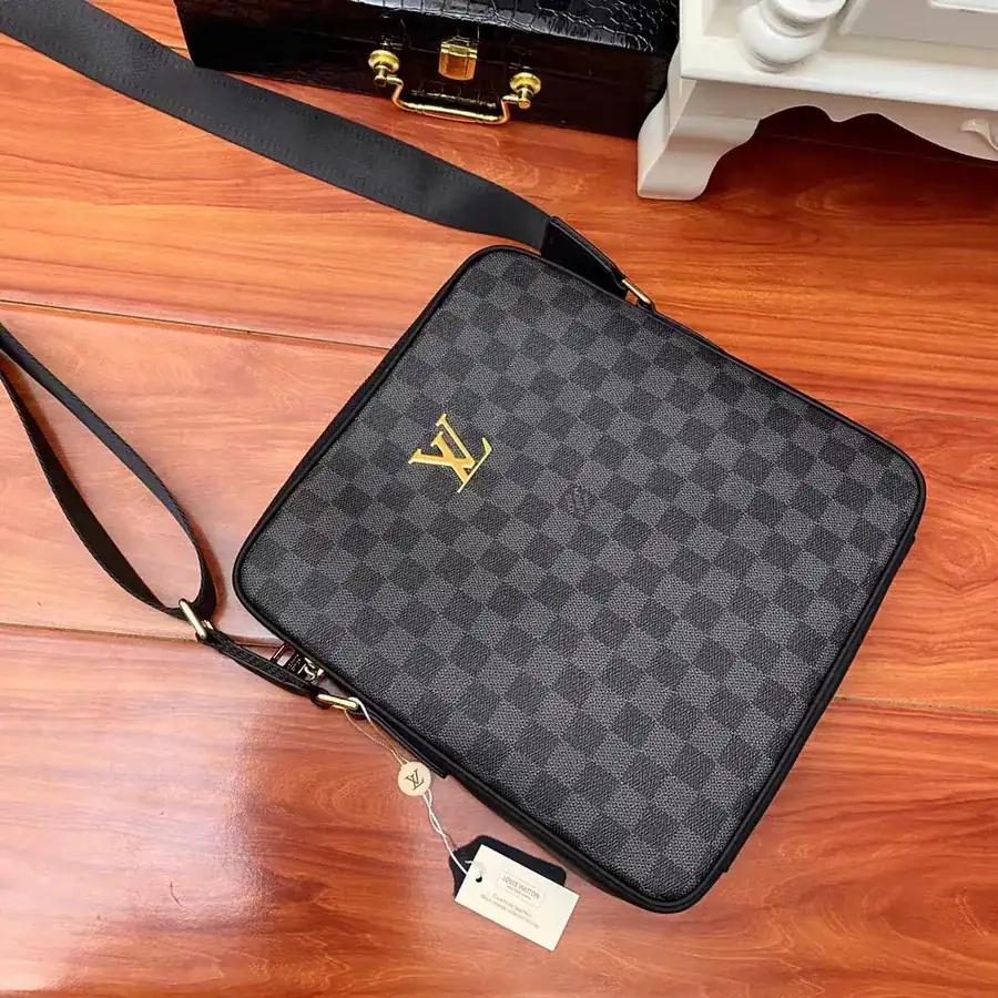 Pochette Voyage in Black Grained Calfskin