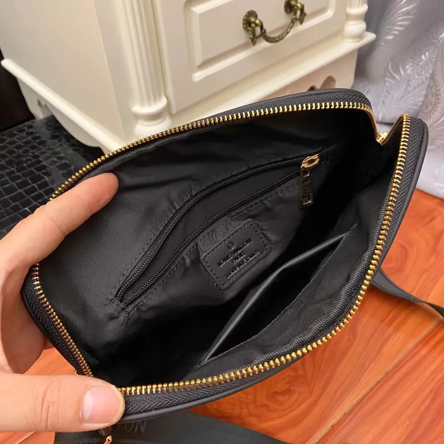 Pochette Voyage in Black Grained Calfskin