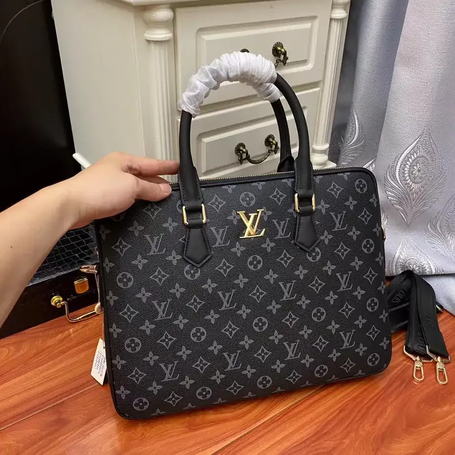 Pochette Voyage in Black Monogram Eclipse