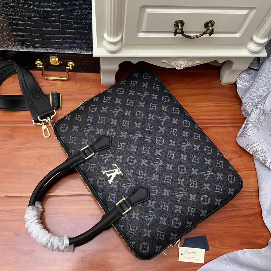 Pochette Voyage in Black Monogram Eclipse