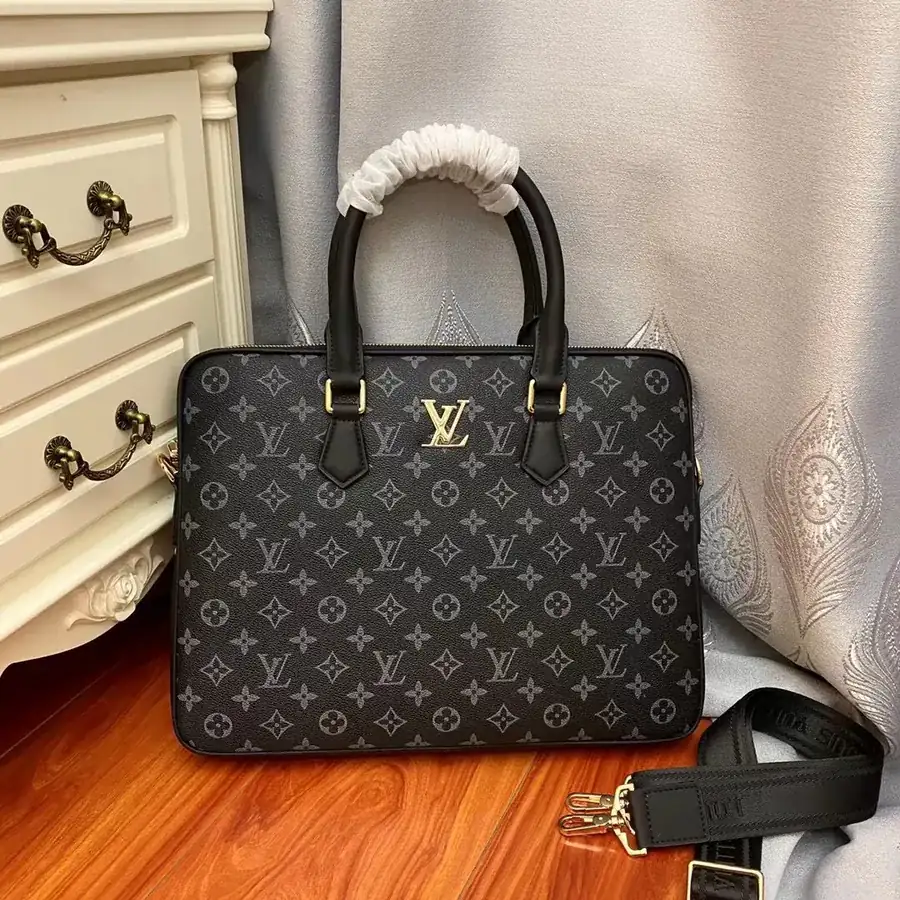 Pochette Voyage in Black Monogram Eclipse