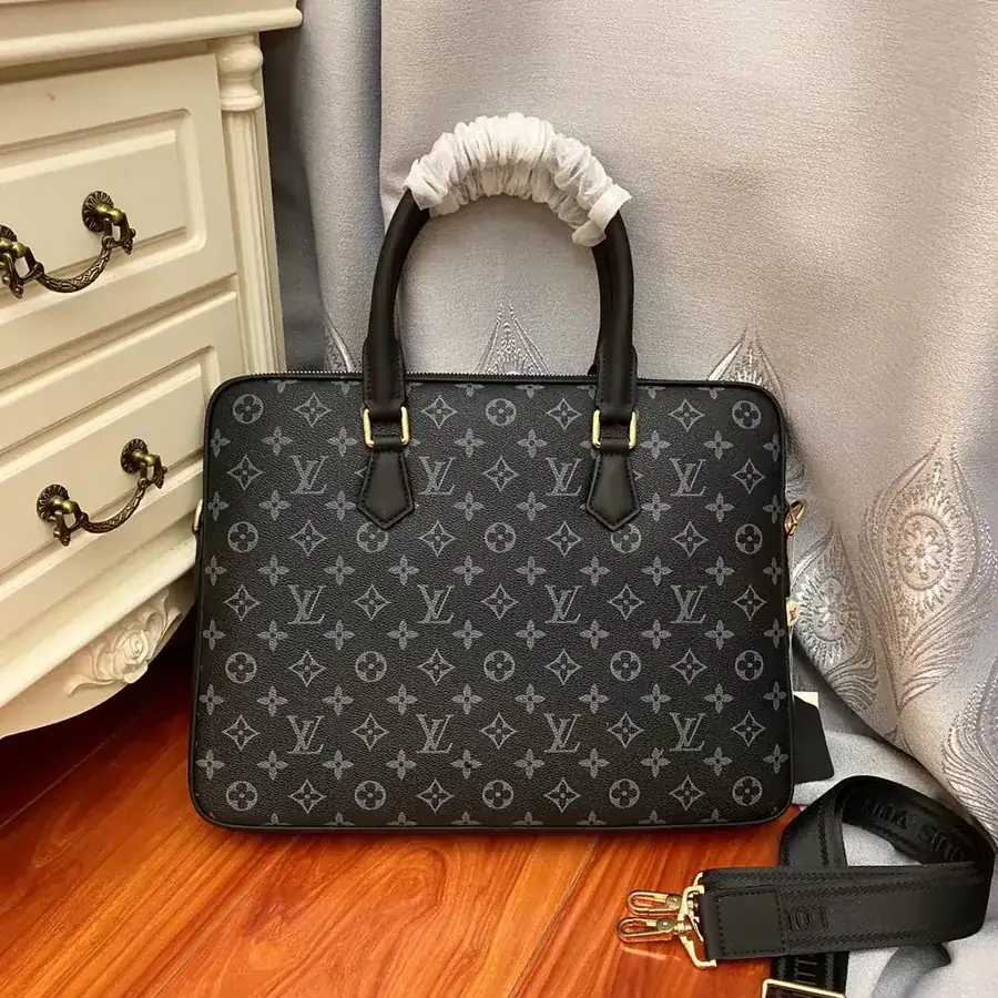 Pochette Voyage in Black Monogram Eclipse