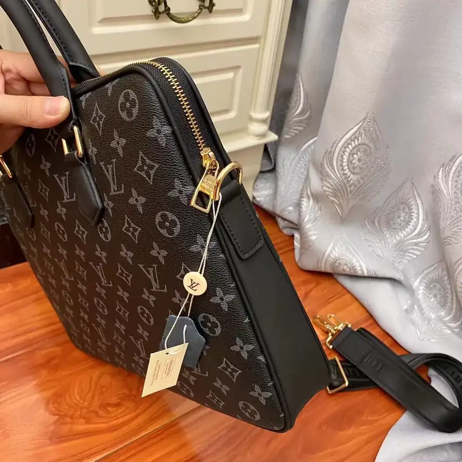 Pochette Voyage in Black Monogram Eclipse