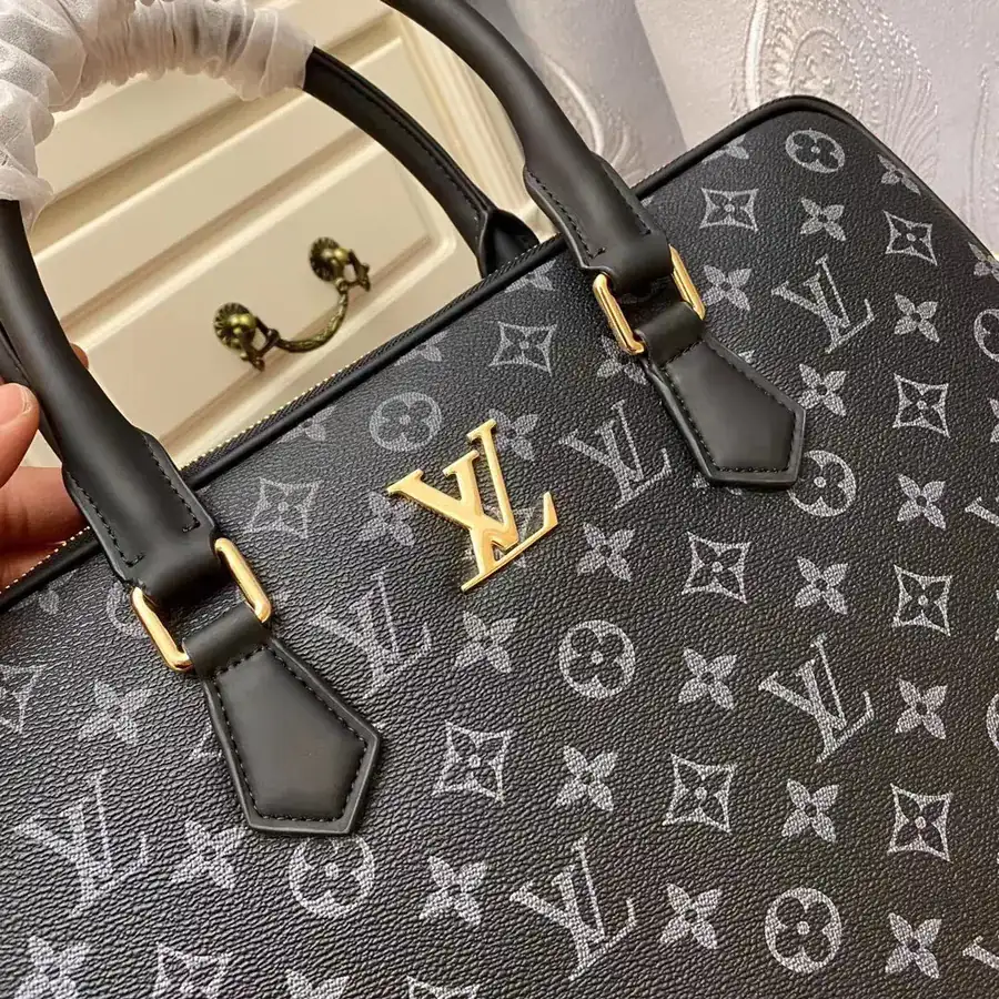 Pochette Voyage in Black Monogram Eclipse