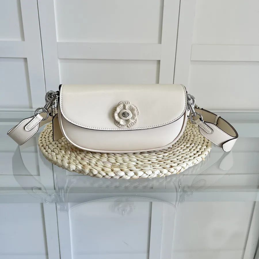 COACH Emmy 23 Saddle Bag with Tea Rose Pattern