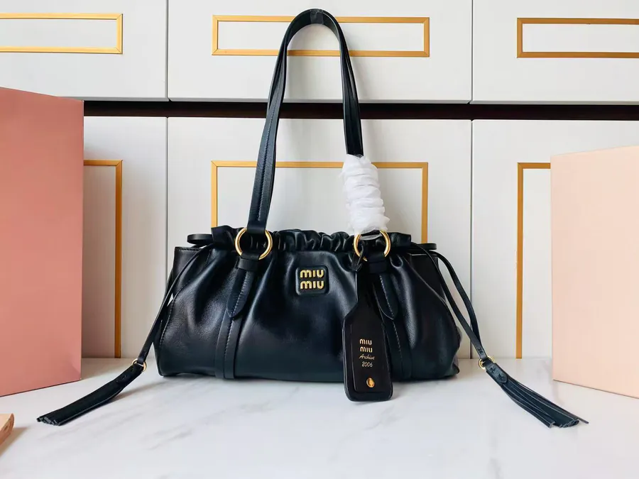 MIU Vintage Bucket Bag with Grained Calfskin and Metal Hardware