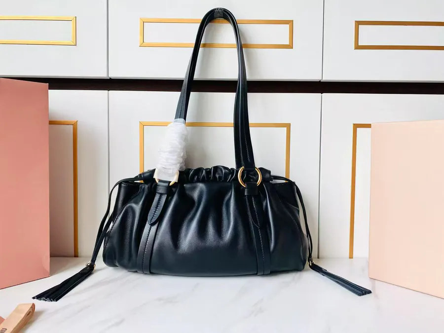 MIU Vintage Bucket Bag with Grained Calfskin and Metal Hardware
