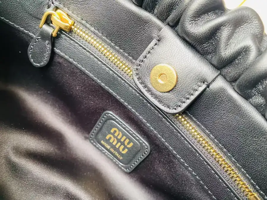 MIU Vintage Bucket Bag with Grained Calfskin and Metal Hardware
