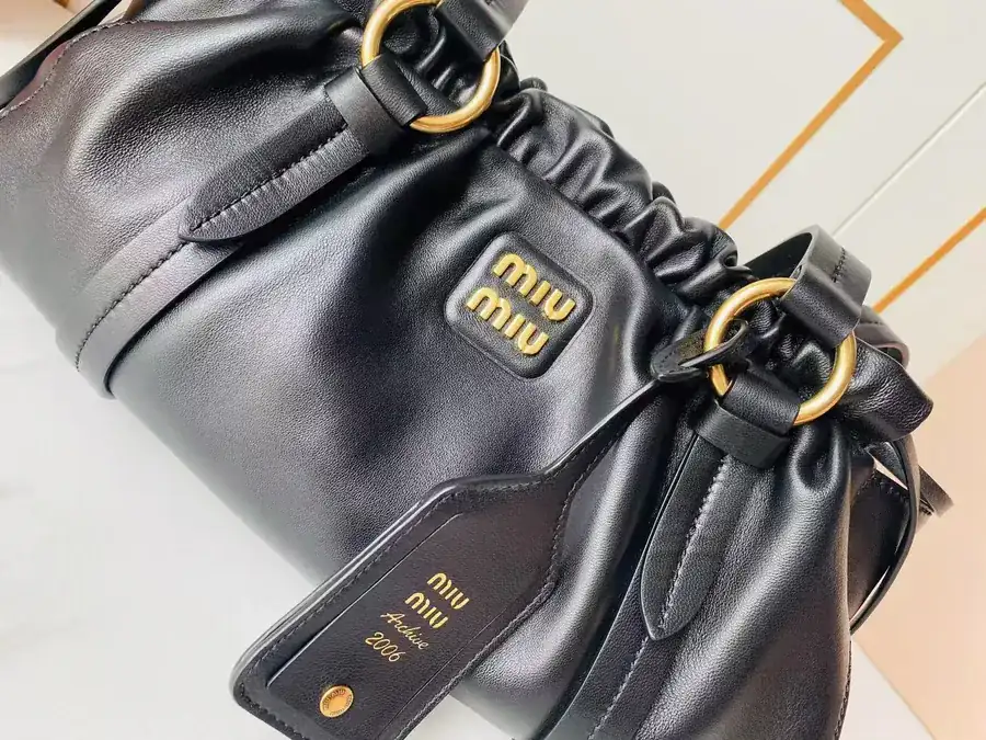 MIU Vintage Bucket Bag with Grained Calfskin and Metal Hardware