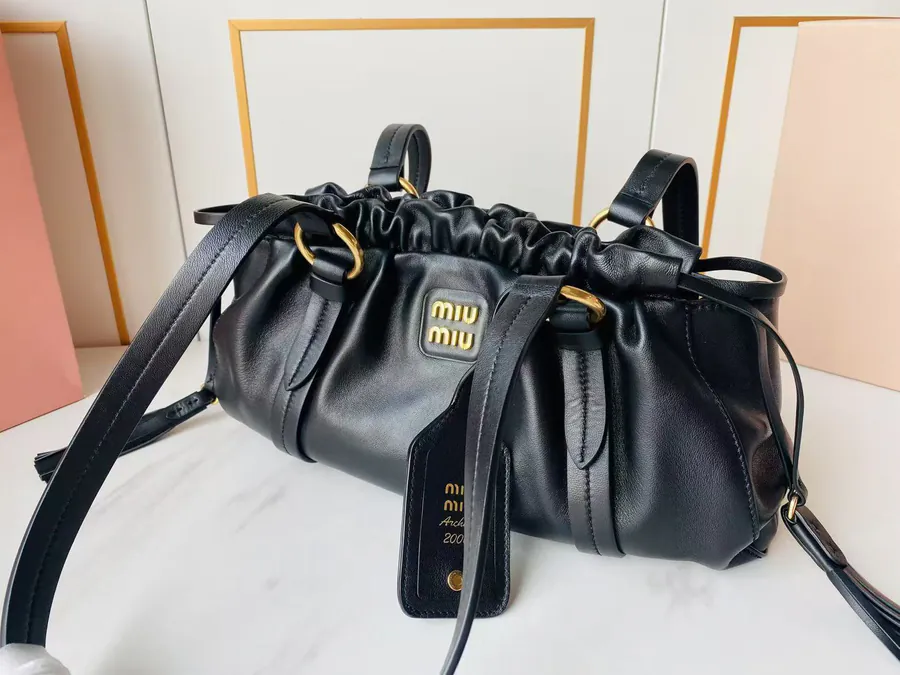 MIU Vintage Bucket Bag with Grained Calfskin and Metal Hardware