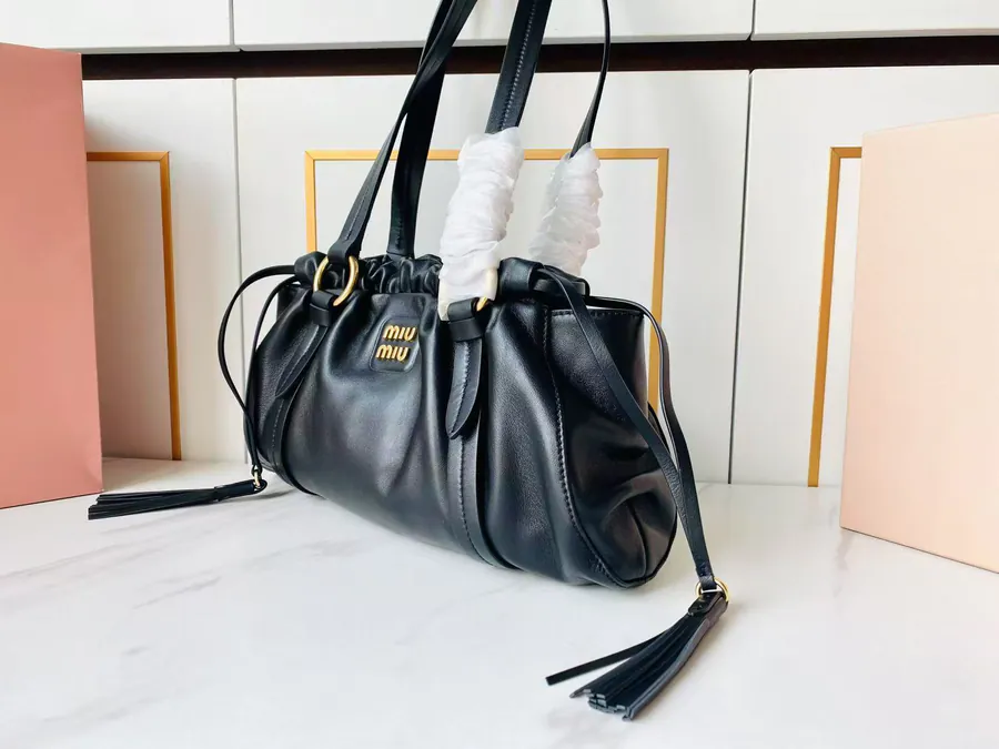 MIU Vintage Bucket Bag with Grained Calfskin and Metal Hardware
