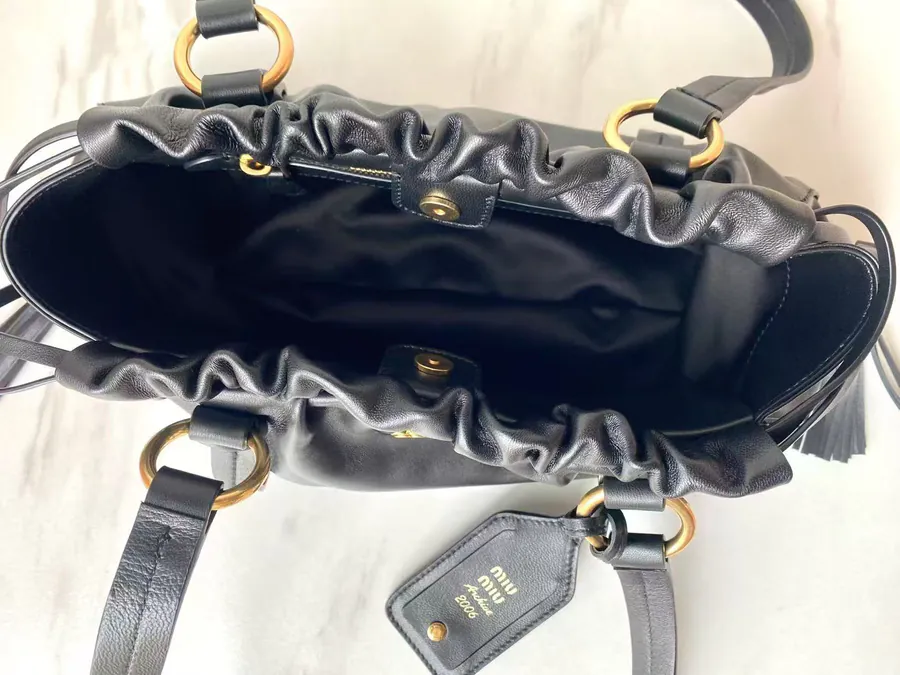 MIU Vintage Bucket Bag with Grained Calfskin and Metal Hardware