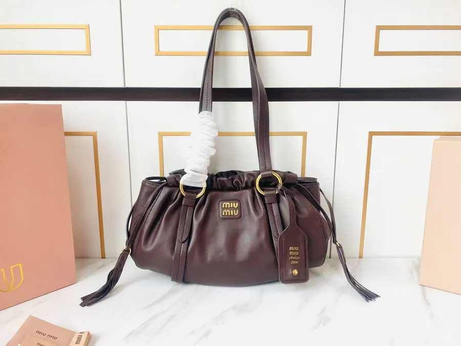 MIU Vintage Bucket Bag with Grained Calfskin and Metal Hardware