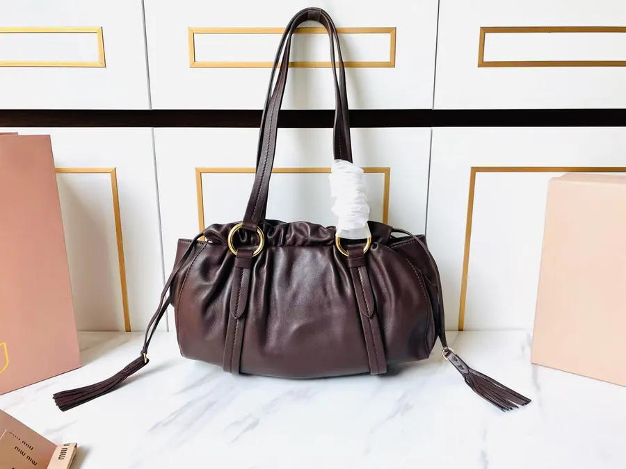 MIU Vintage Bucket Bag with Grained Calfskin and Metal Hardware