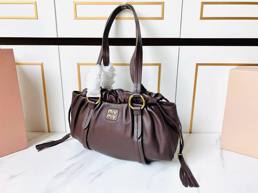 MIU Vintage Bucket Bag with Grained Calfskin and Metal Hardware