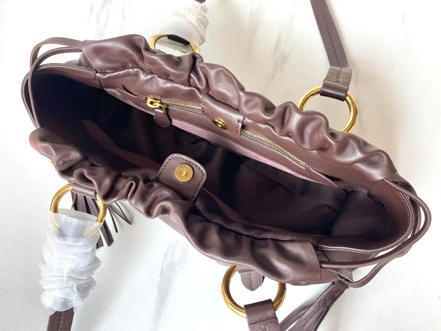 MIU Vintage Bucket Bag with Grained Calfskin and Metal Hardware