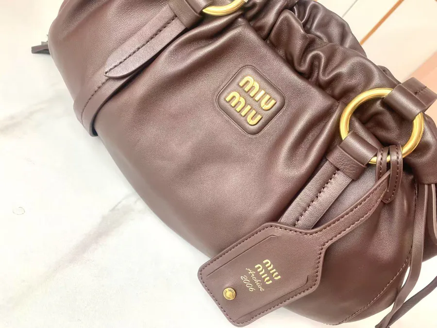 MIU Vintage Bucket Bag with Grained Calfskin and Metal Hardware
